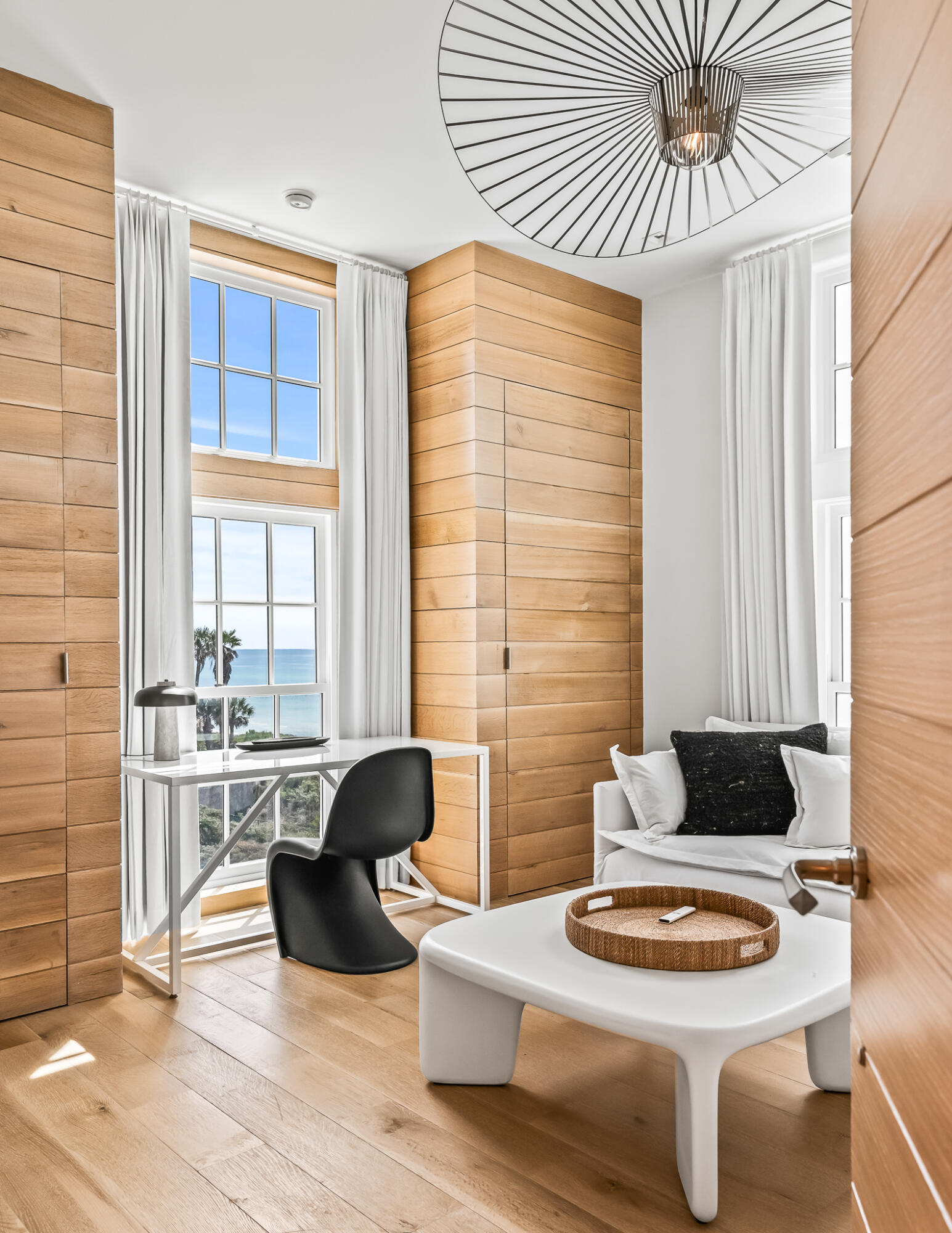 290 Sea Garden St Inlet Beach, Unit 402 Inlet Beach, FL 32461 - Photo 12 of 43 a living room with furniture and a large window