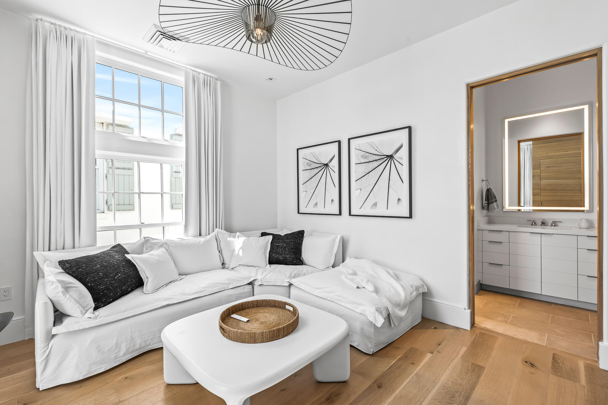 290 Sea Garden St Inlet Beach, Unit 402 Inlet Beach, FL 32461 - Photo 13 of 43 a living room with furniture and wooden floor