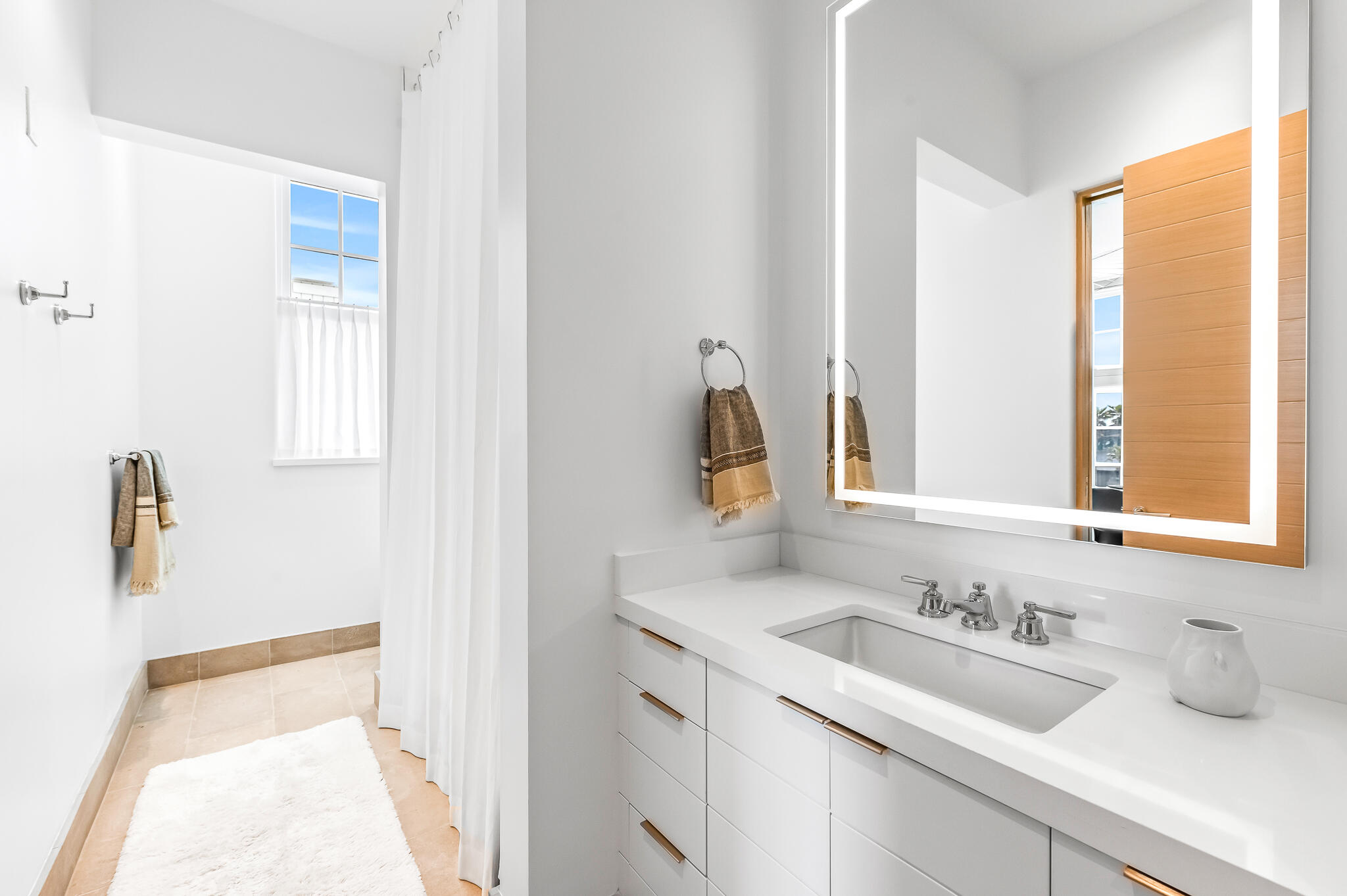290 Sea Garden St Inlet Beach, Unit 402 Inlet Beach, FL 32461 - Photo 15 of 43 a bathroom with a sink and a mirror