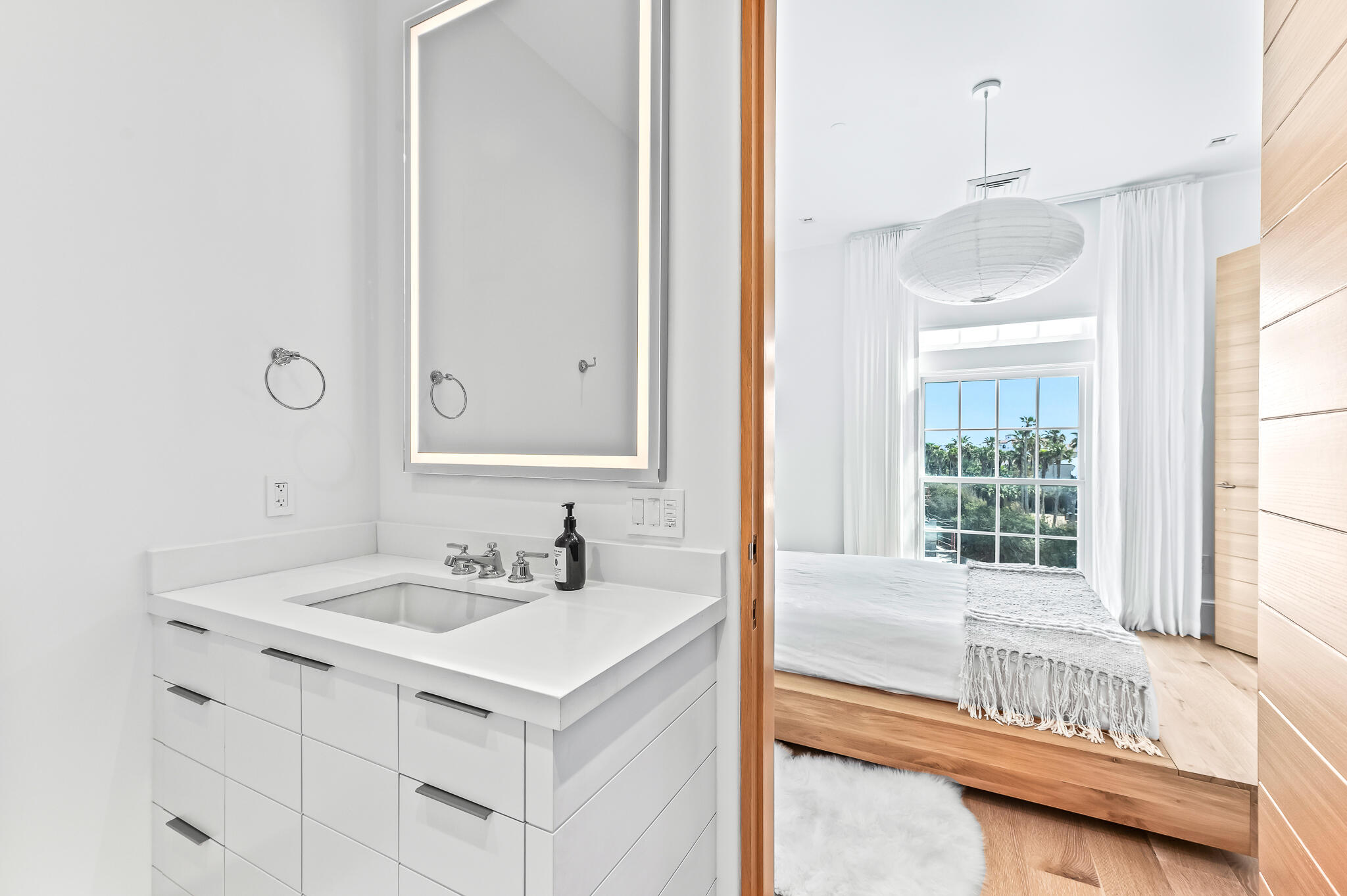 290 Sea Garden St Inlet Beach, Unit 402 Inlet Beach, FL 32461 - Photo 18 of 43 a bathroom with a sink and a mirror