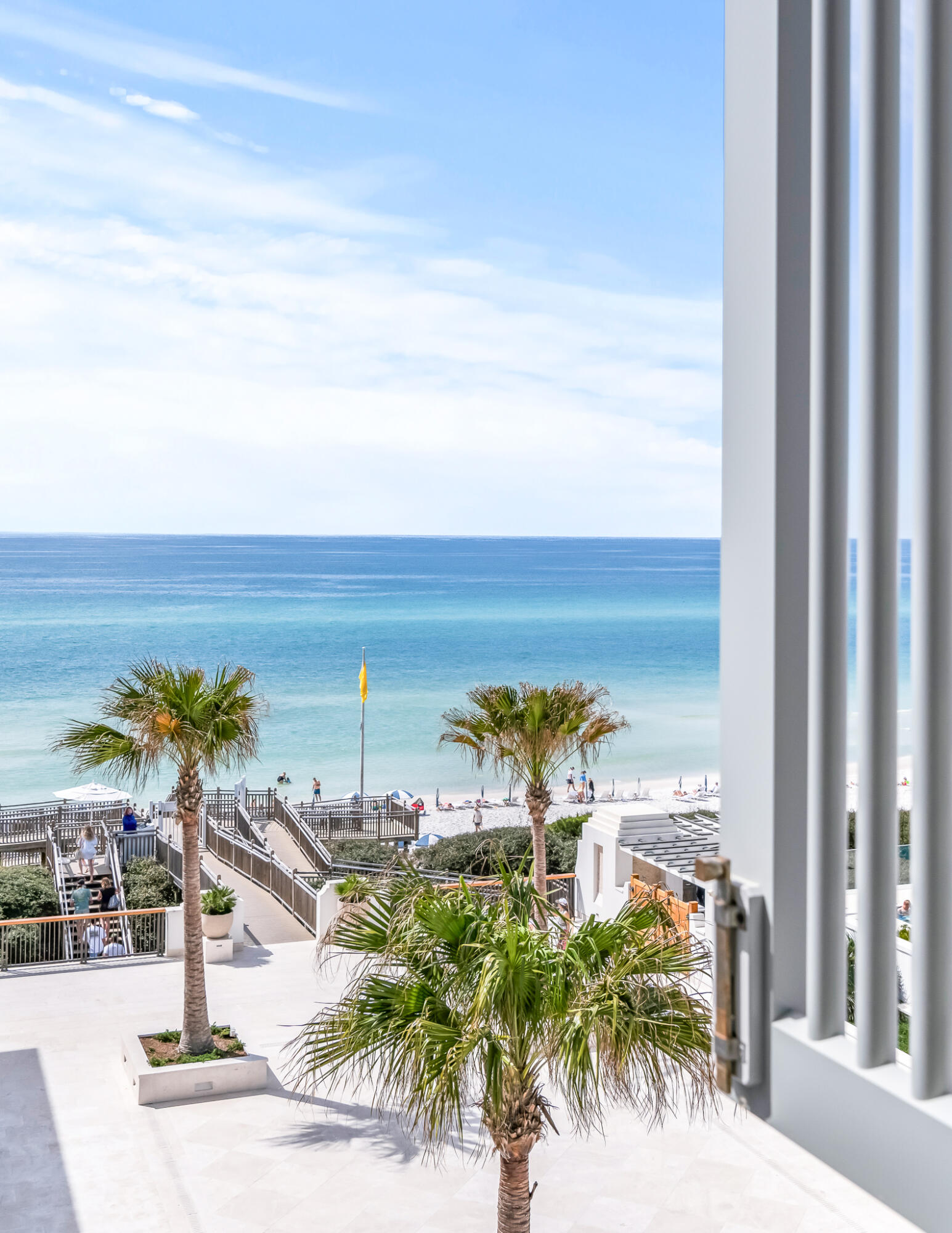 290 Sea Garden St Inlet Beach, Unit 402 Inlet Beach, FL 32461 - Photo 21 of 43 a view of a terrace with palm trees