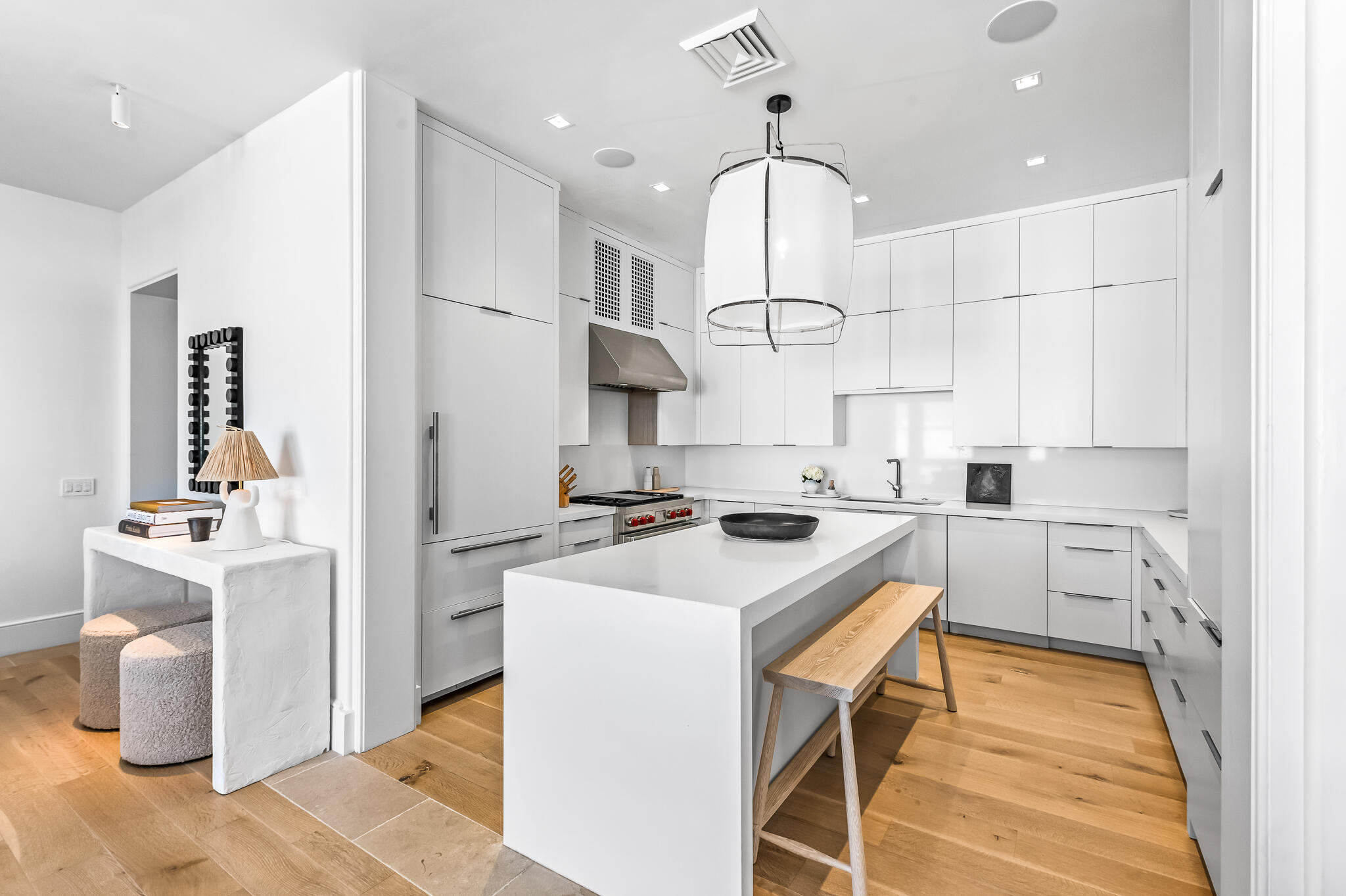 290 Sea Garden St Inlet Beach, Unit 402 Inlet Beach, FL 32461 - Photo 4 of 43 a kitchen that has a sink a stove and a chandelier