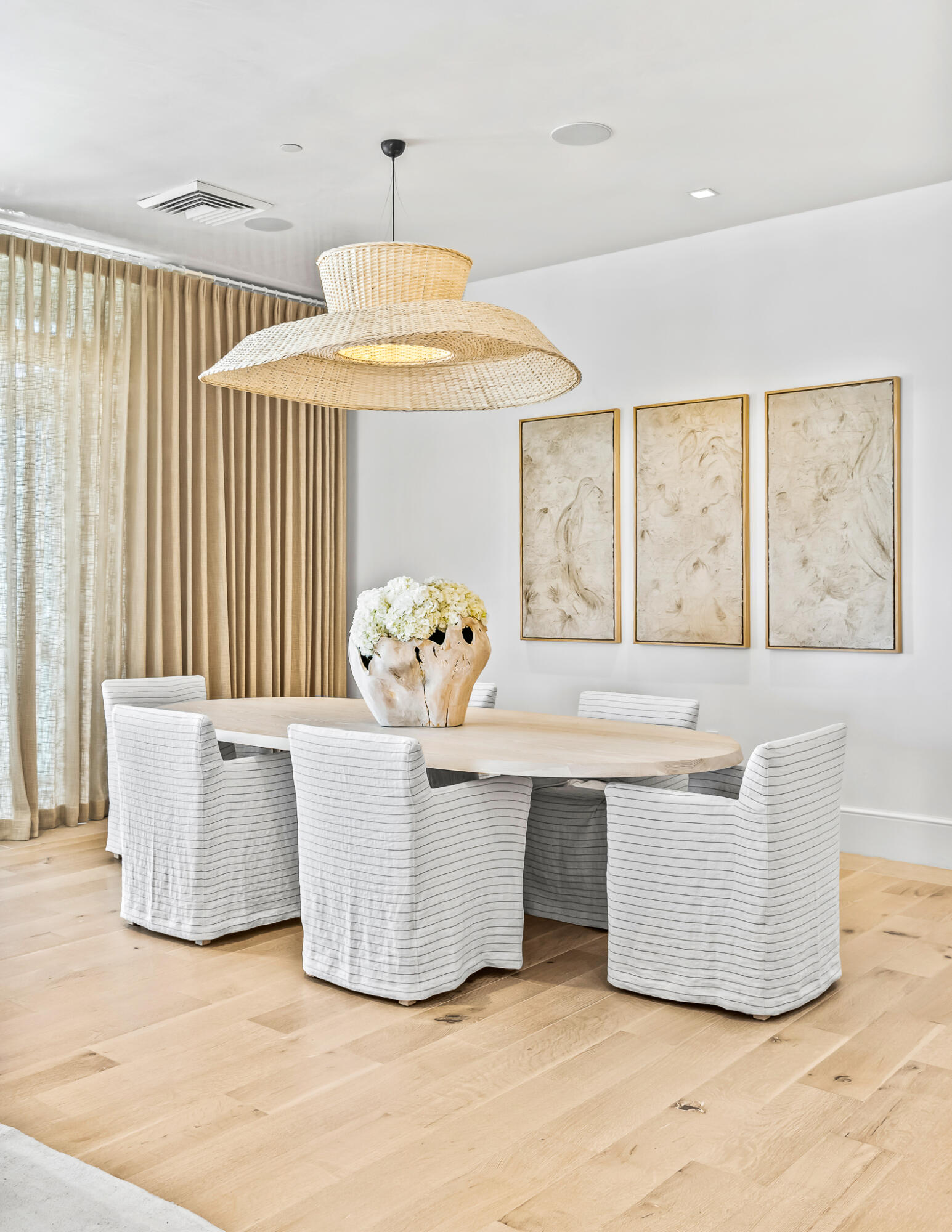 290 Sea Garden St Inlet Beach, Unit 402 Inlet Beach, FL 32461 - Photo 42 of 43 a living room with a table and a chandelier