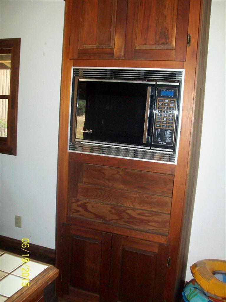 4271 Rockydale Road Cave Junction, OR 97523 - Photo 12 of 35 Build in microwave cabinet, with extra s