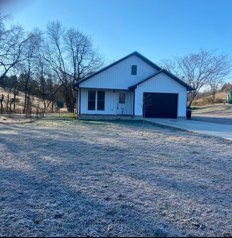 a house view with a backyard space