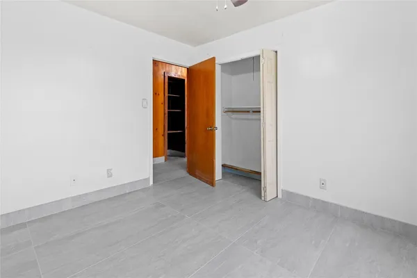a view of bathroom with a sink and a mirror