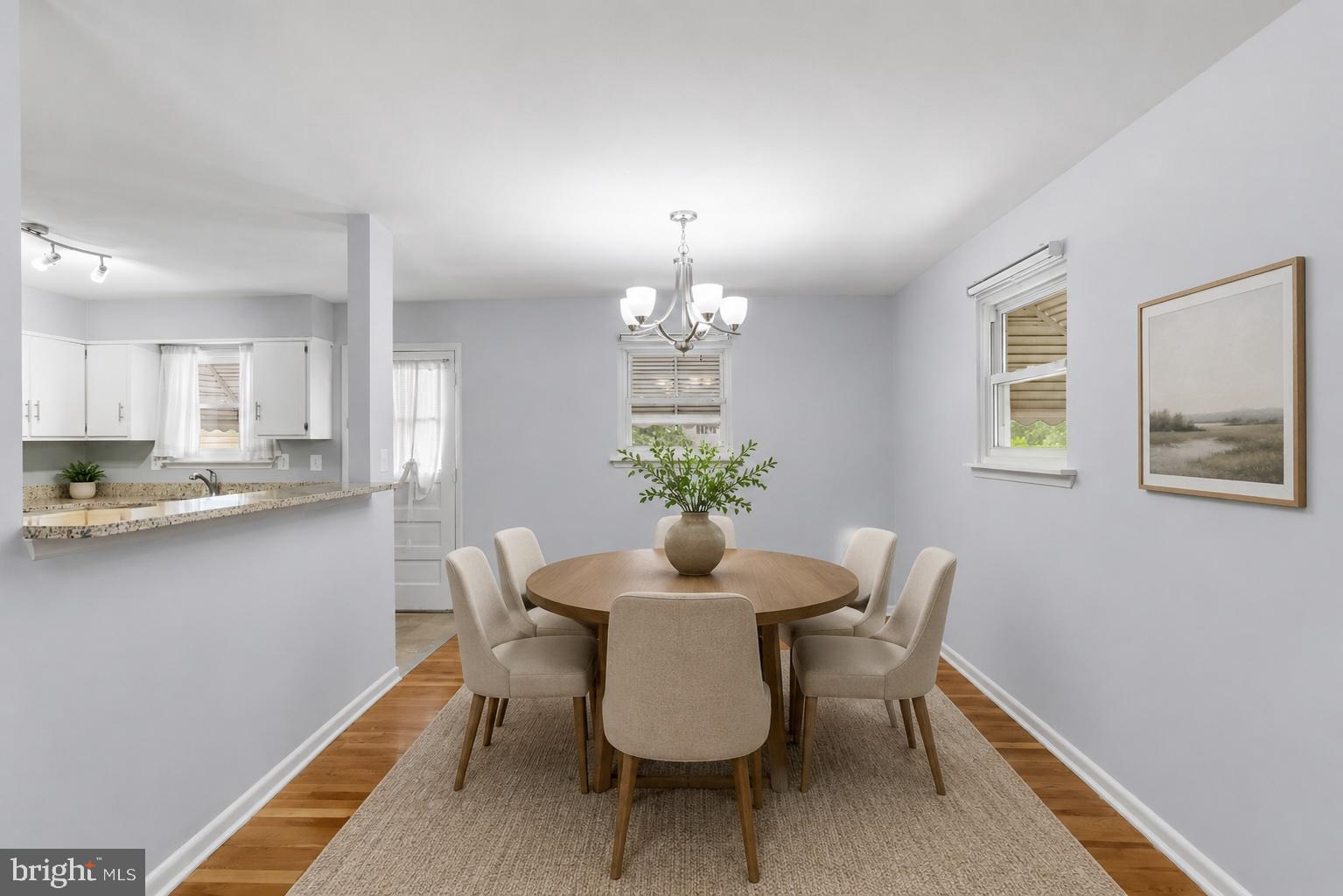 1201 Chillum Manor Road Hyattsville, MD 20783 - Photo 14 of 49 a dining room with furniture and window