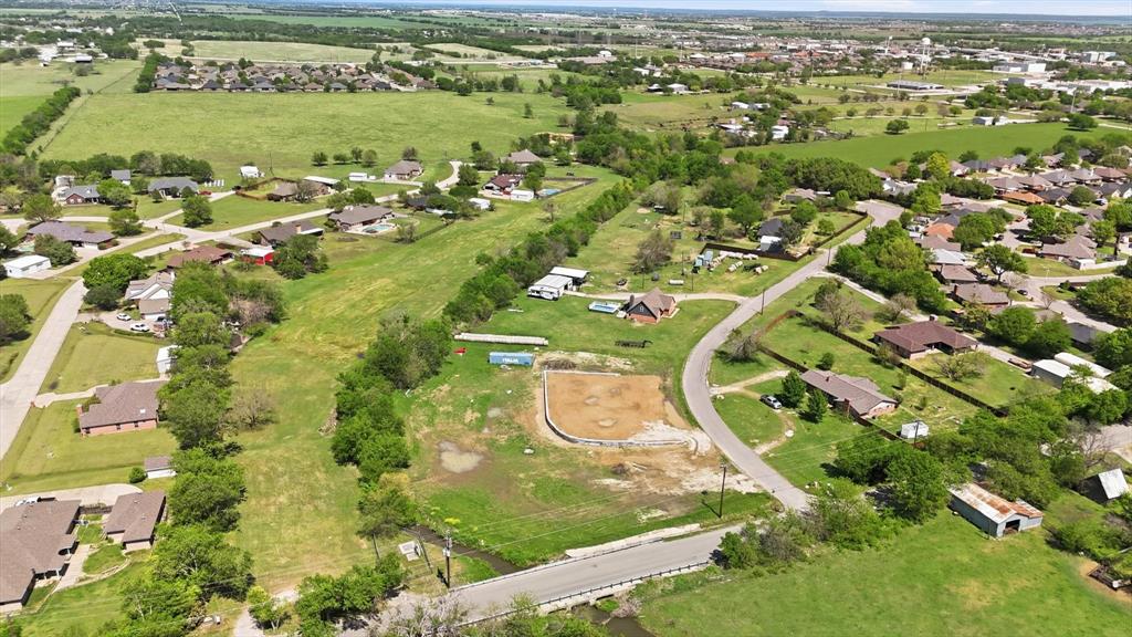501 Rising Star Lane Sanger, TX 76266 - Photo 9 of 17 an aerial view of residential houses with outdoor space