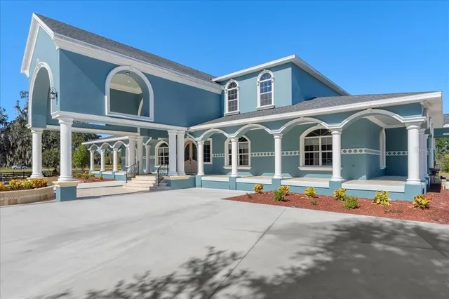 a view of a bathroom with a sink and mirror