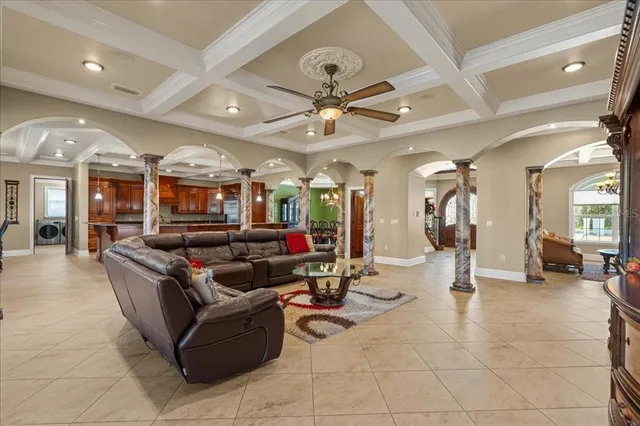 a swimming pool with outdoor seating