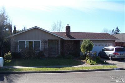 4813 Burlington Street Santa Rosa, CA 95405 - Photo 1 of 12 a front view of a house with garden