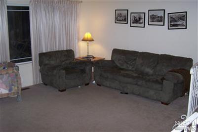 4813 Burlington Street Santa Rosa, CA 95405 - Photo 10 of 12 a living room with furniture and a lamp