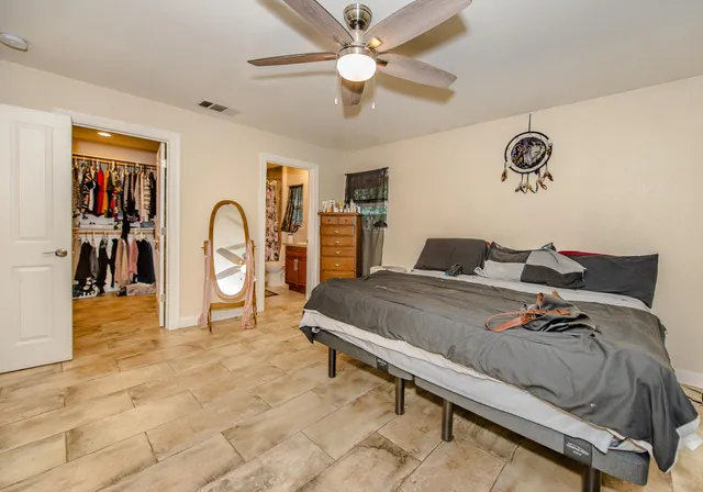 a view of a livingroom with furniture and a flat screen tv