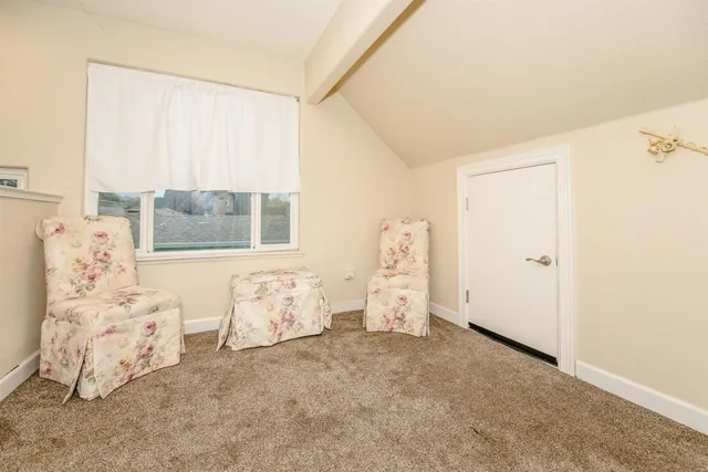 a bath room with a sink and a mirror