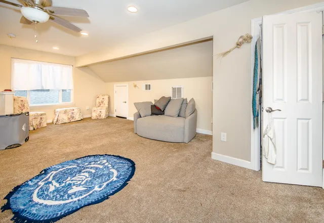 a bath room with a sink and a mirror