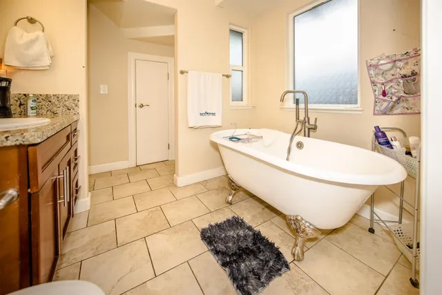 a view of a backyard with a tub