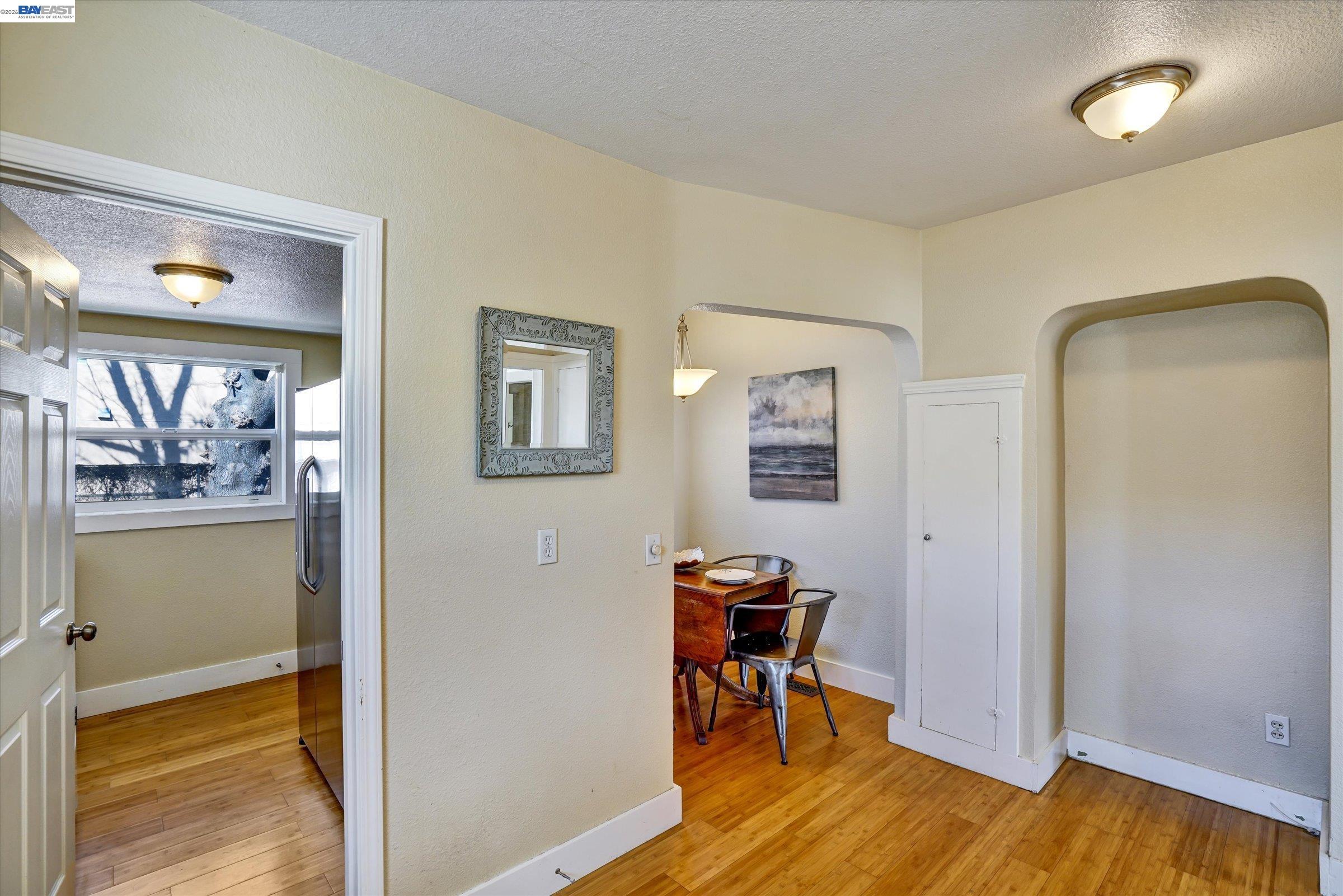 445 West Lowell Avenue Tracy, CA 95376 - Photo 14 of 44 a view of a workspace with furniture and wooden floor