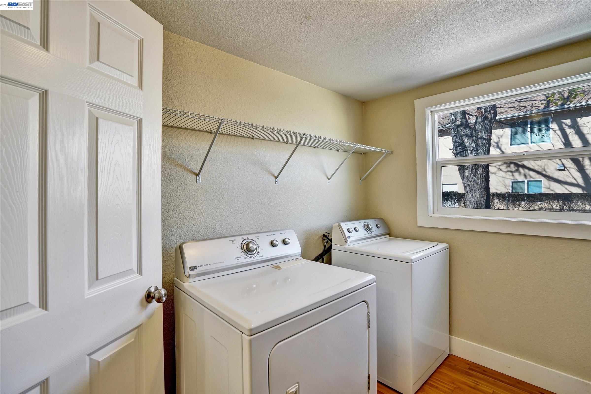 445 West Lowell Avenue Tracy, CA 95376 - Photo 16 of 44 a utility room with dryer and washer