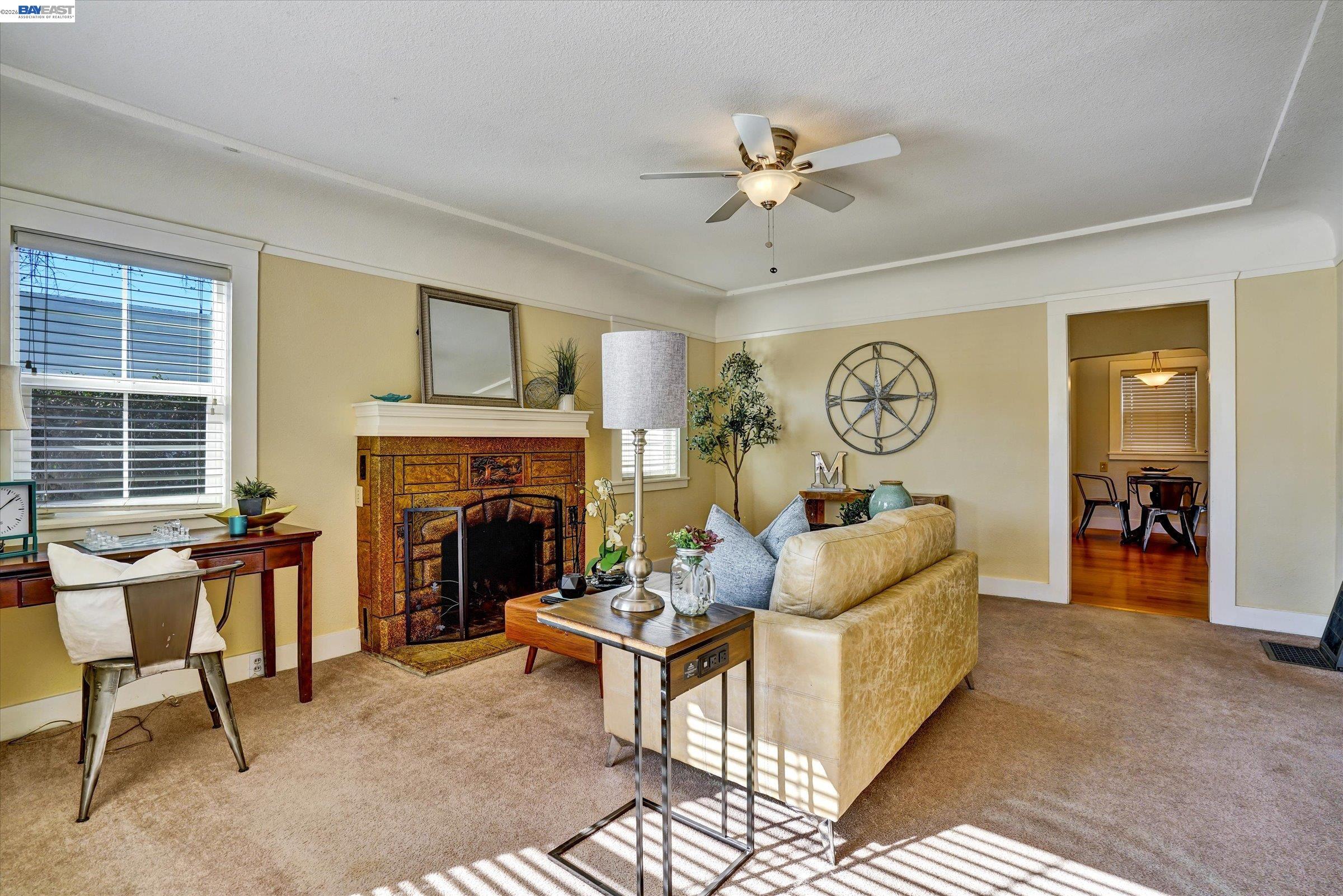 445 West Lowell Avenue Tracy, CA 95376 - Photo 4 of 44 a living room with furniture and a fireplace