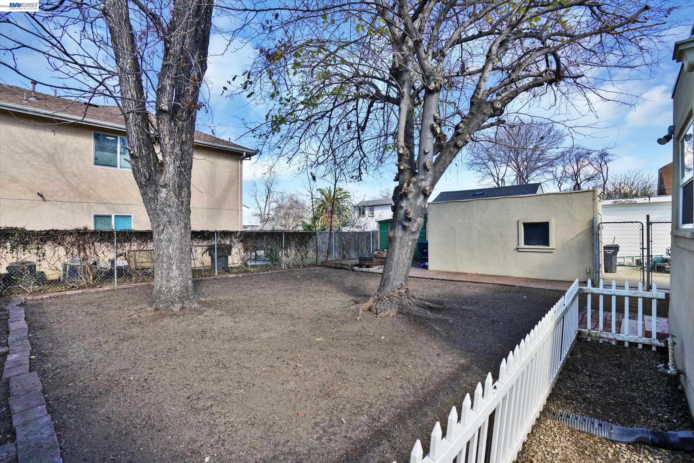 445 West Lowell Avenue Tracy, CA 95376 - Photo 41 of 44 a view of a house with backyard and sitting area
