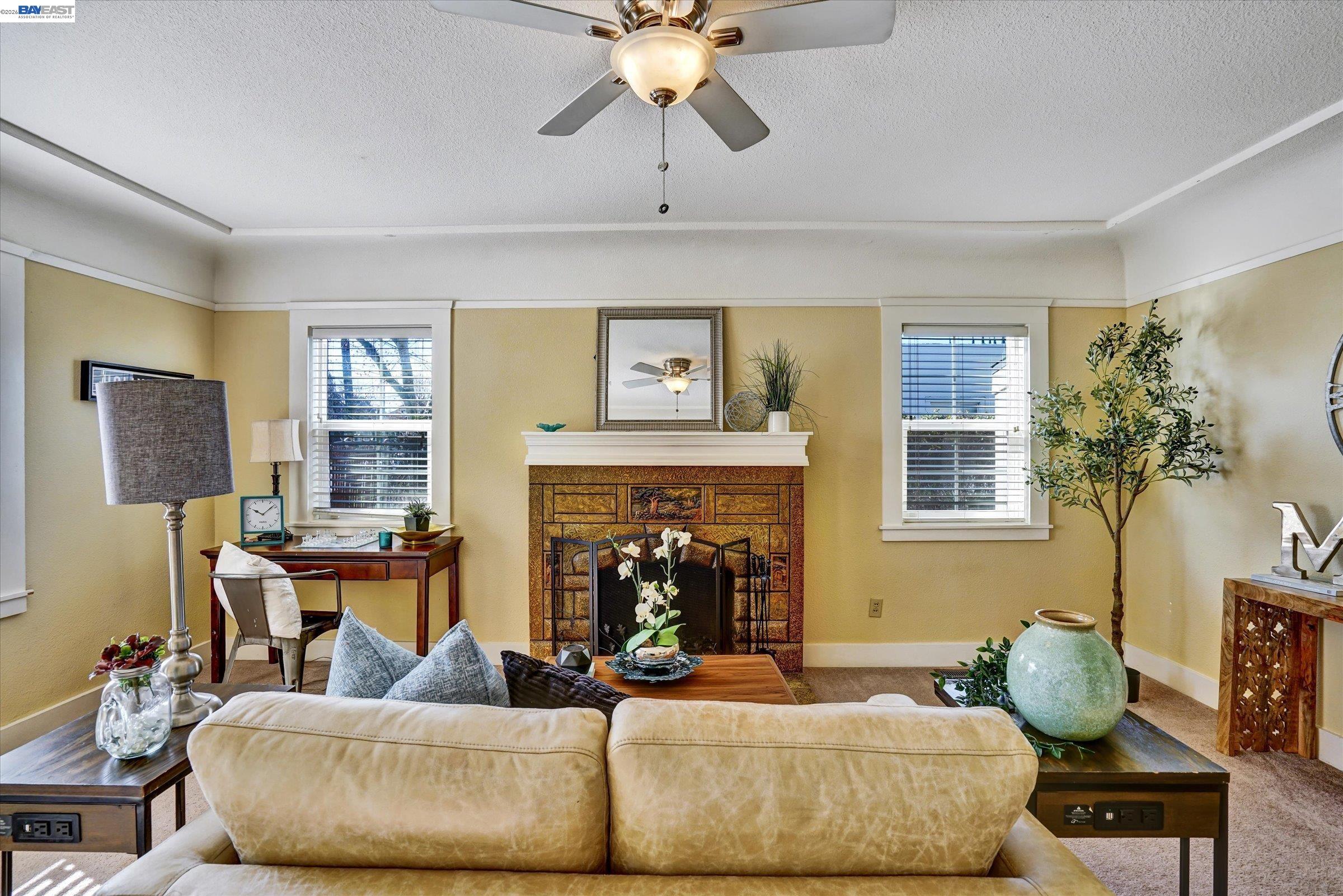 445 West Lowell Avenue Tracy, CA 95376 - Photo 5 of 44 a living room with furniture and a fireplace