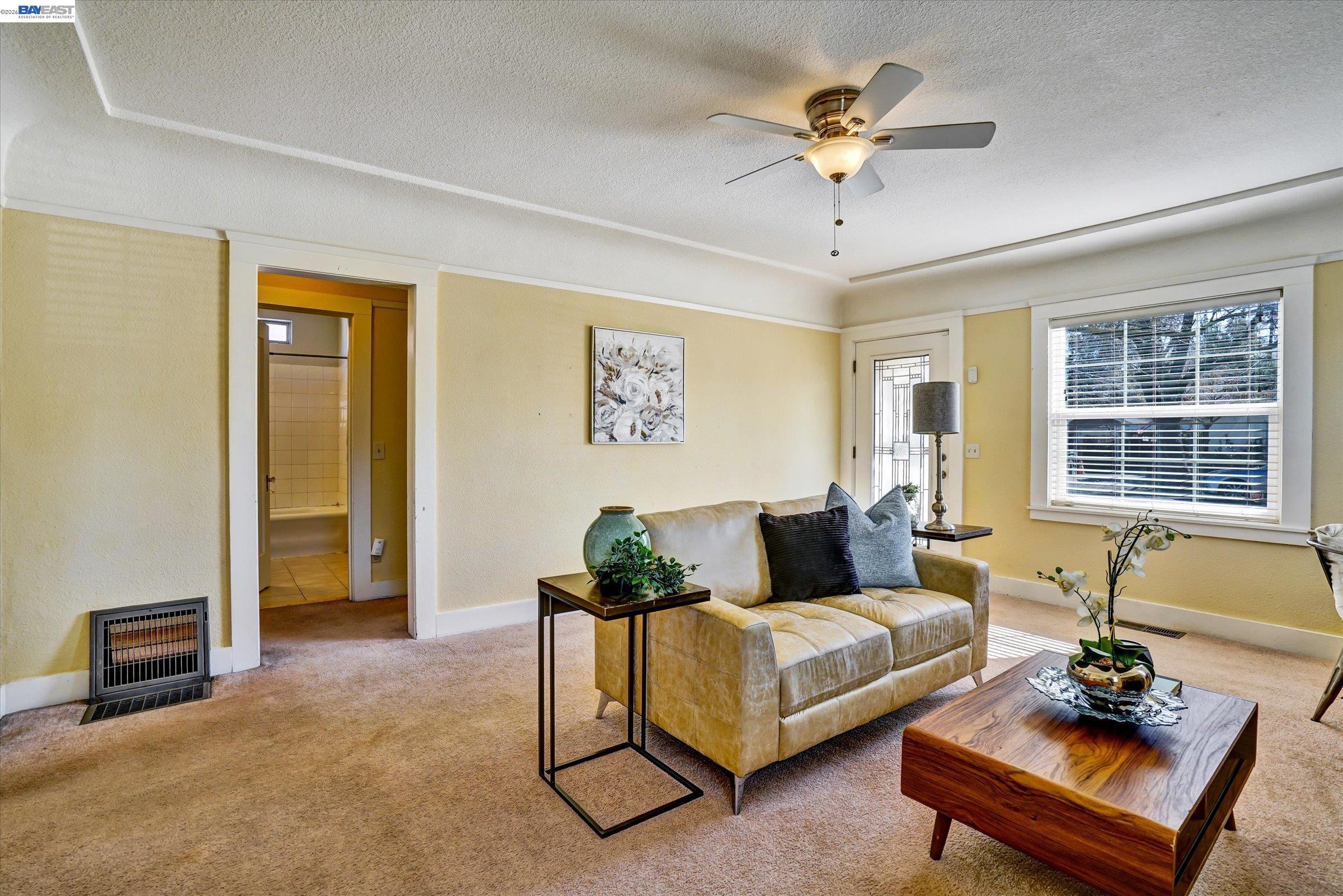 445 West Lowell Avenue Tracy, CA 95376 - Photo 8 of 44 a living room with furniture and a window