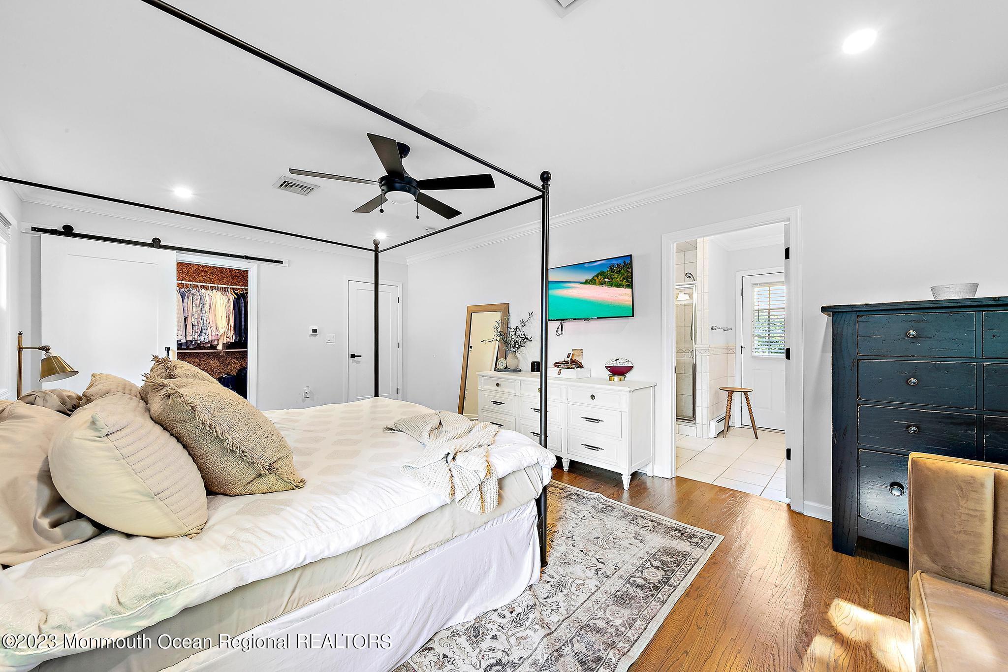 7 Sagamore Avenue Oceanport, NJ 07757 - Photo 28 of 44 a spacious bedroom with a bed and a dresser