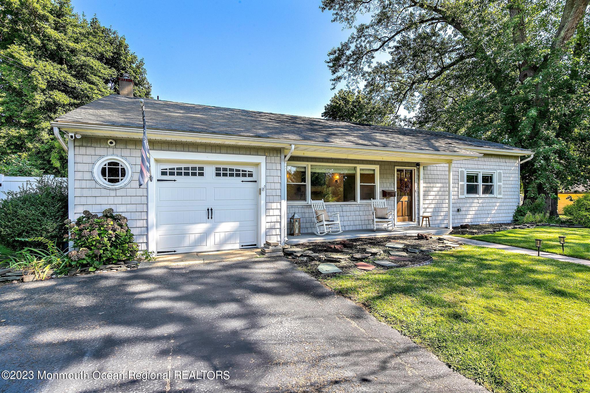 7 Sagamore Avenue Oceanport, NJ 07757 - Photo 3 of 44 a front view of a house with garden