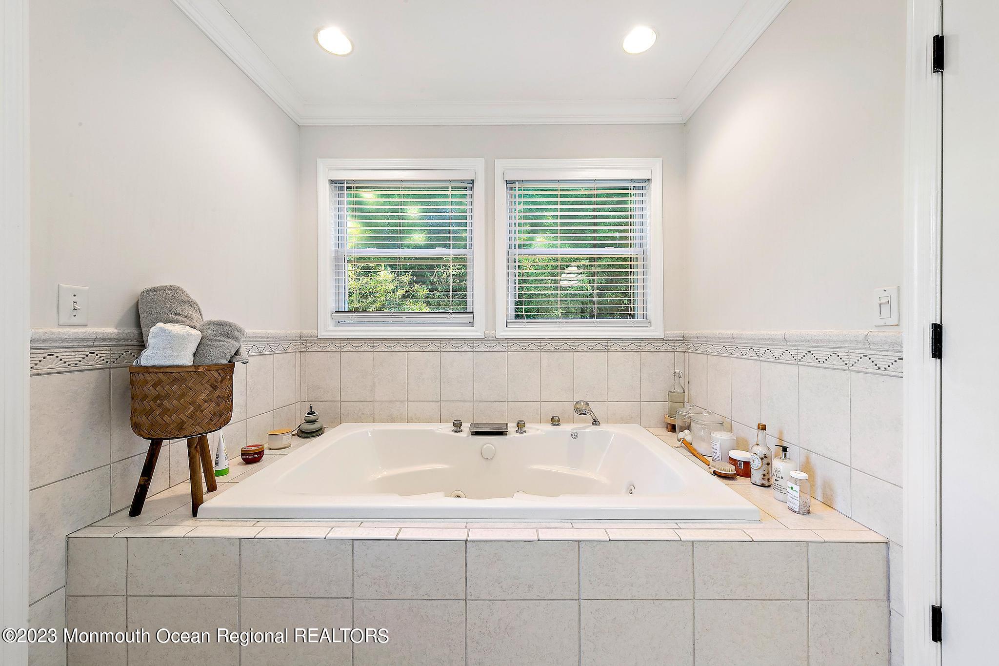 7 Sagamore Avenue Oceanport, NJ 07757 - Photo 31 of 44 a bathroom with a bathtub and a sink