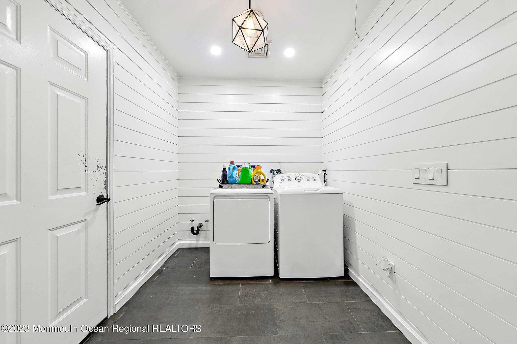 7 Sagamore Avenue Oceanport, NJ 07757 - Photo 37 of 44 a utility room with dryer and washer