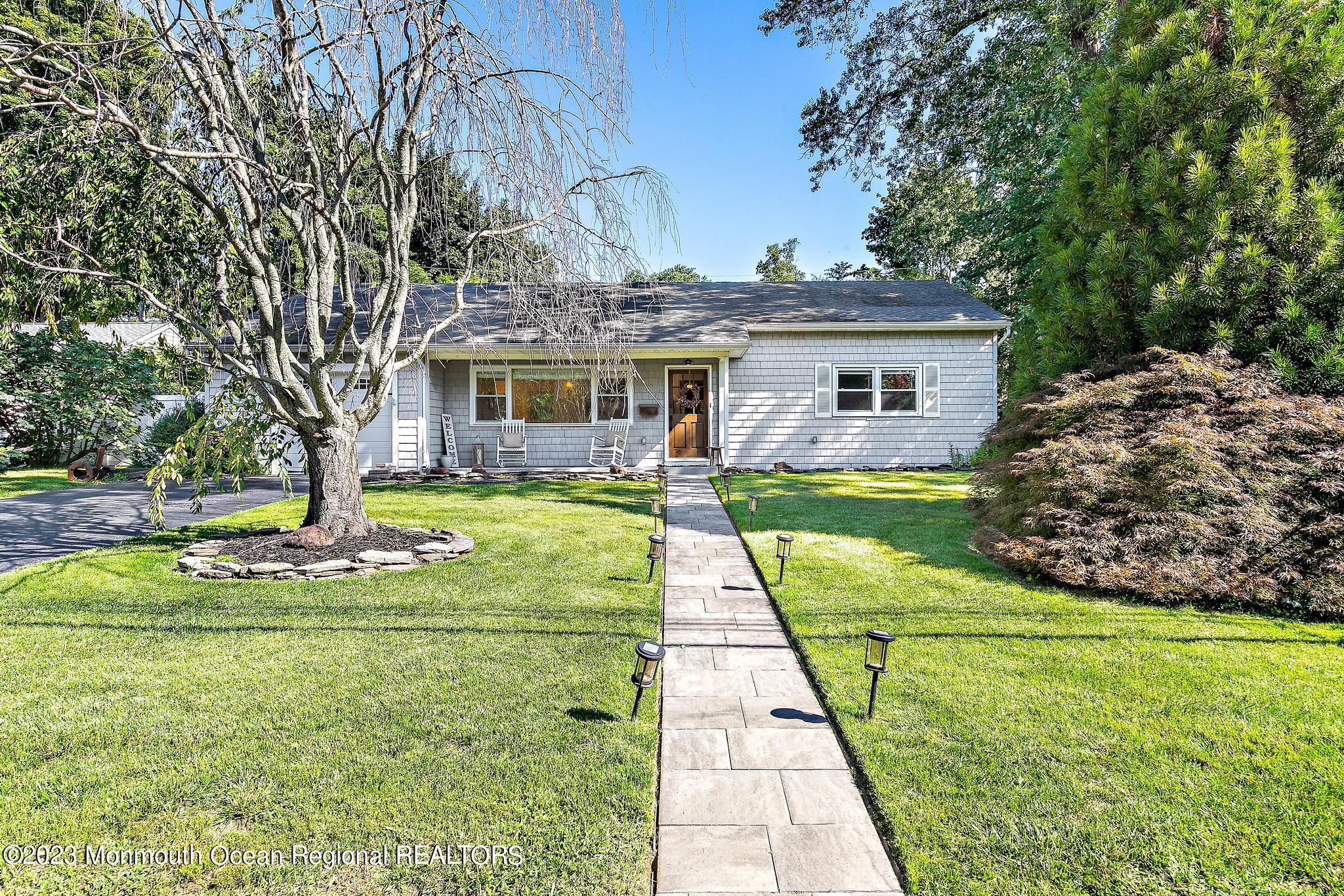 7 Sagamore Avenue Oceanport, NJ 07757 - Photo 4 of 44 a view of a house with a big yard potted plants and large tree