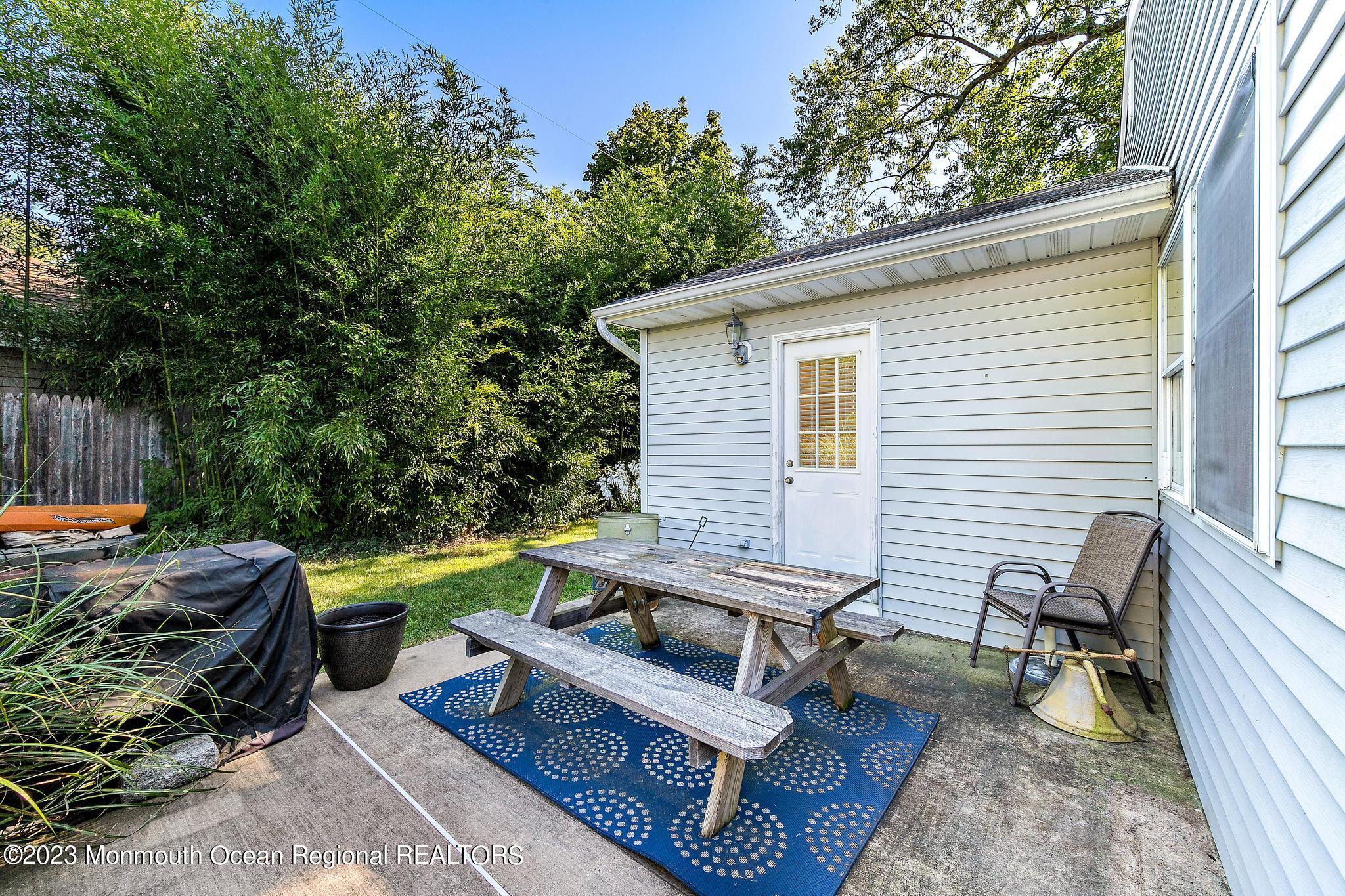 7 Sagamore Avenue Oceanport, NJ 07757 - Photo 42 of 44 a view of a patio with chairs and a table
