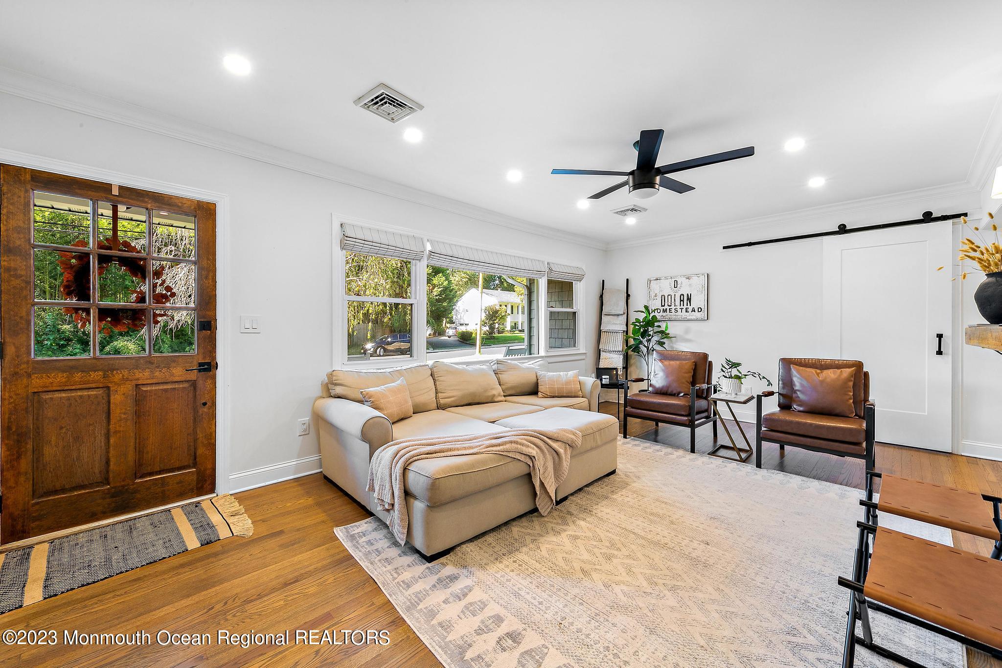 7 Sagamore Avenue Oceanport, NJ 07757 - Photo 9 of 44 a bedroom with a bed couch dresser and a window