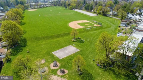 a view of a golf course with a lake