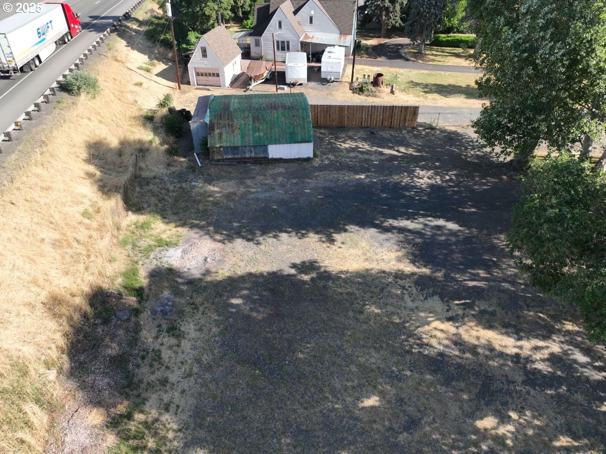 West 2nd Street The Dalles, OR 97058 - Photo 8 of 31 a view of a yard with large trees