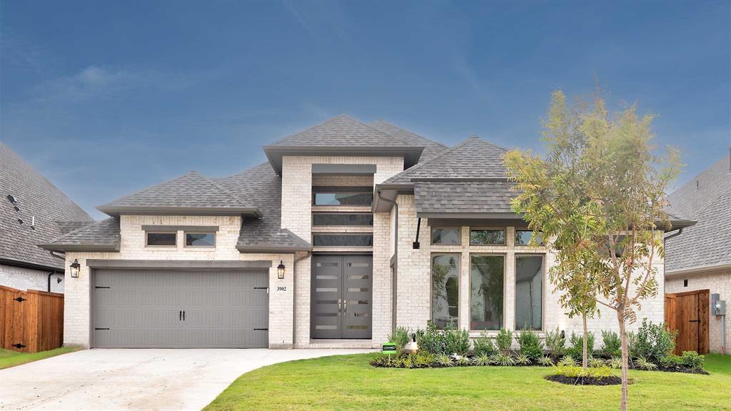 3902 MacArthur Drive Melissa, TX 75454 - Photo 1 of 1 a front view of a house with a garden