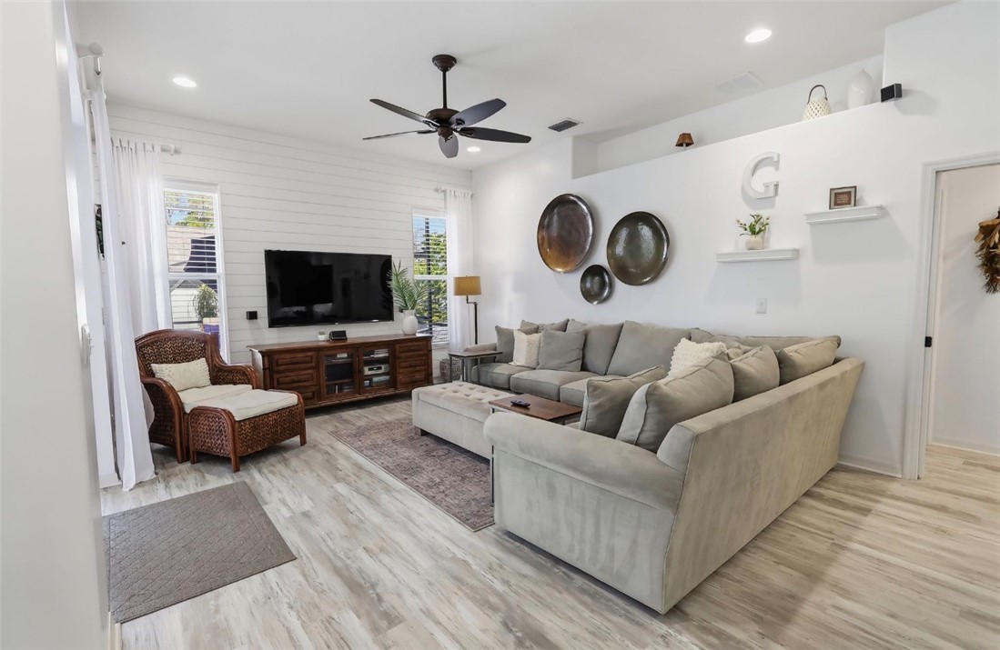 1771 Mistletoe Street Sebastian, FL 32958 - Photo 13 of 36 a living room with furniture and a flat screen tv