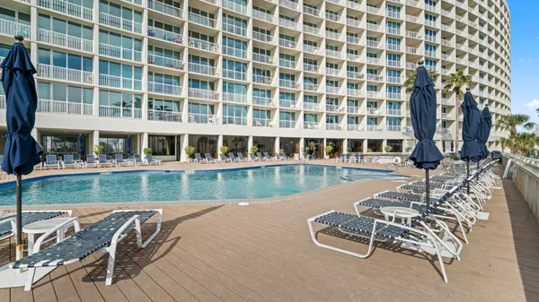 front view of a building with a swimming pool