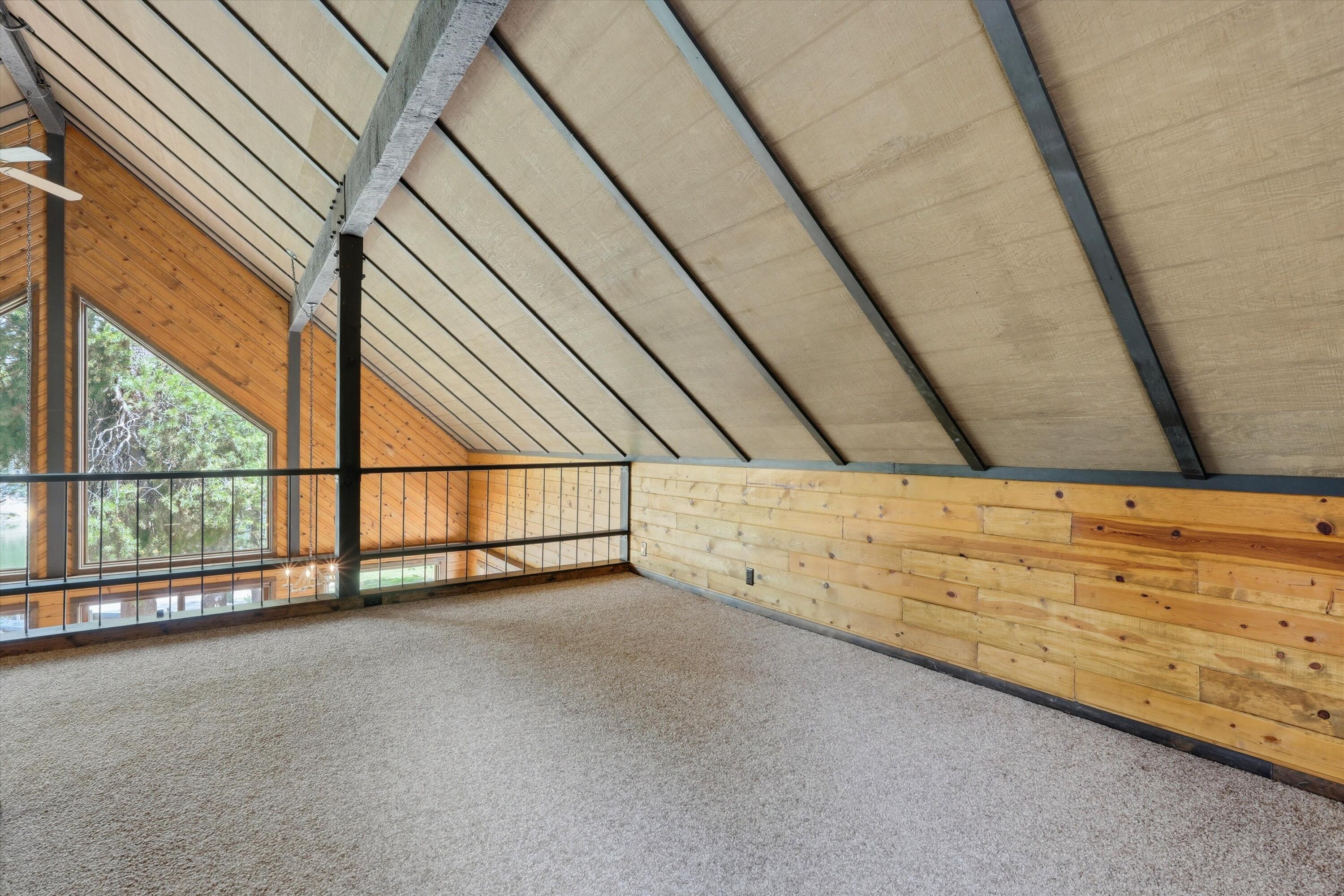 56446 Eclipse Drive Bend, OR 97707 - Photo 28 of 42 a view of a room with wooden walls