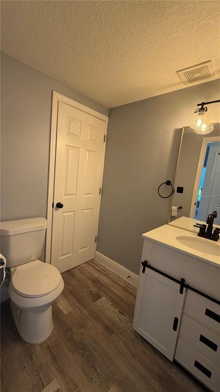 1941 Brancaster Circle Ocoee, FL 34761 - Photo 11 of 33 a bathroom with a sink toilet and shower