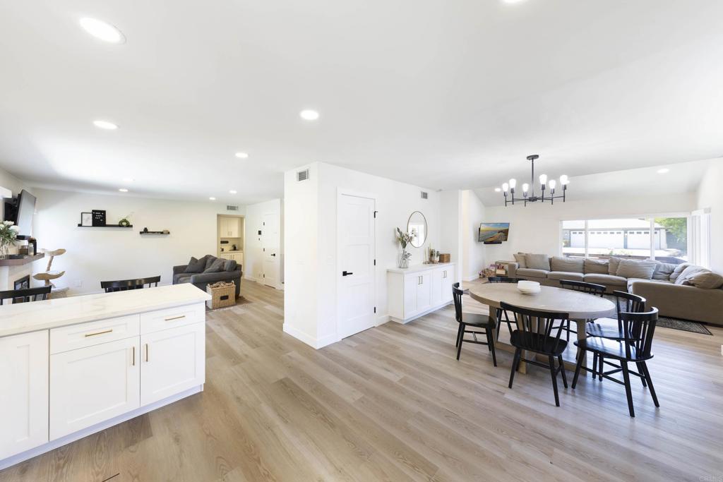 3577 Winslow Road Oceanside, CA 92056 - Photo 10 of 53 a view of a dining room with furniture and wooden floor