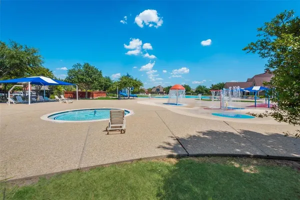 a view of a park with a slide