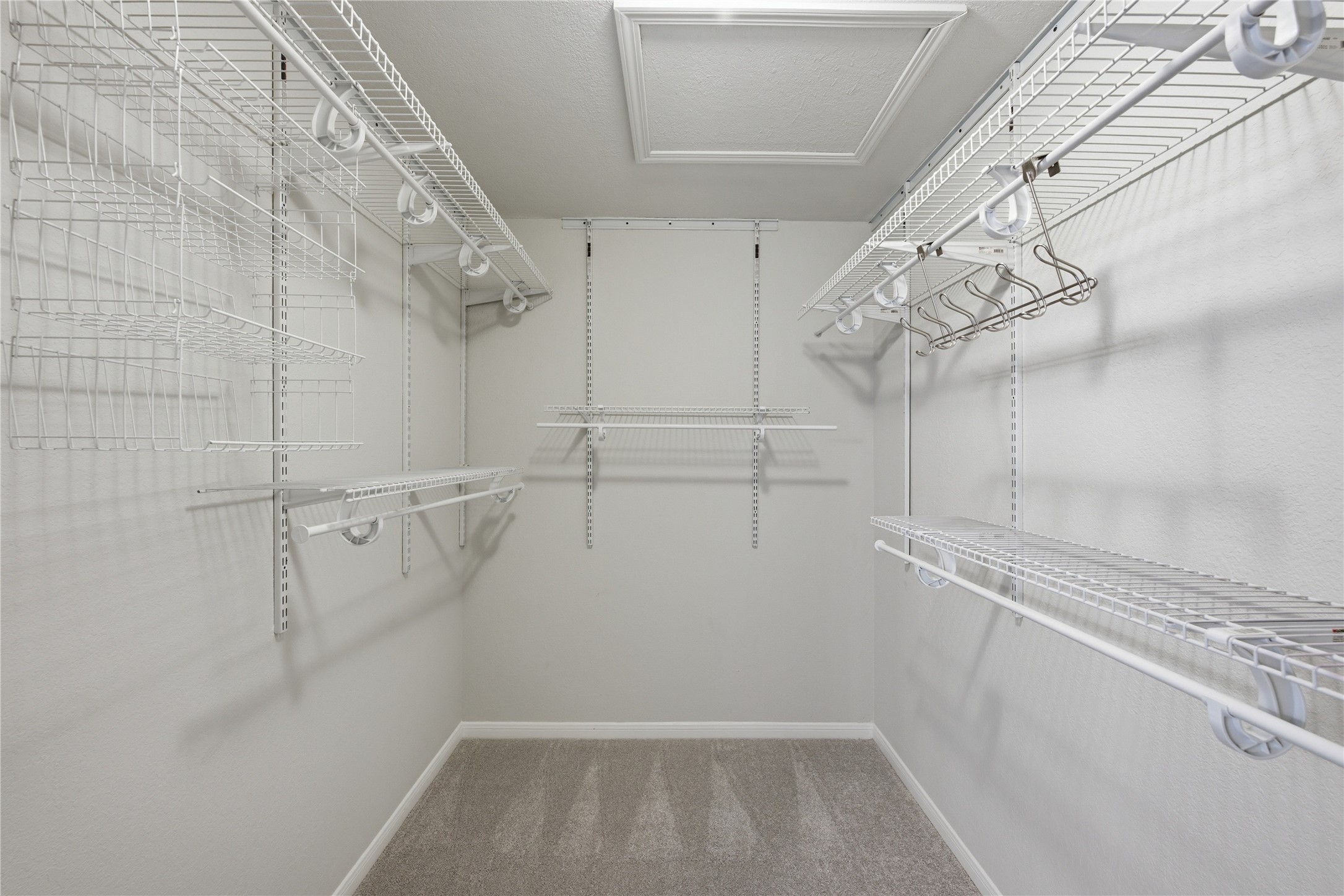 1317 Mimosa Pass Cedar Park, TX 78613 - Photo 11 of 20 a view of a room with racks on the wall
