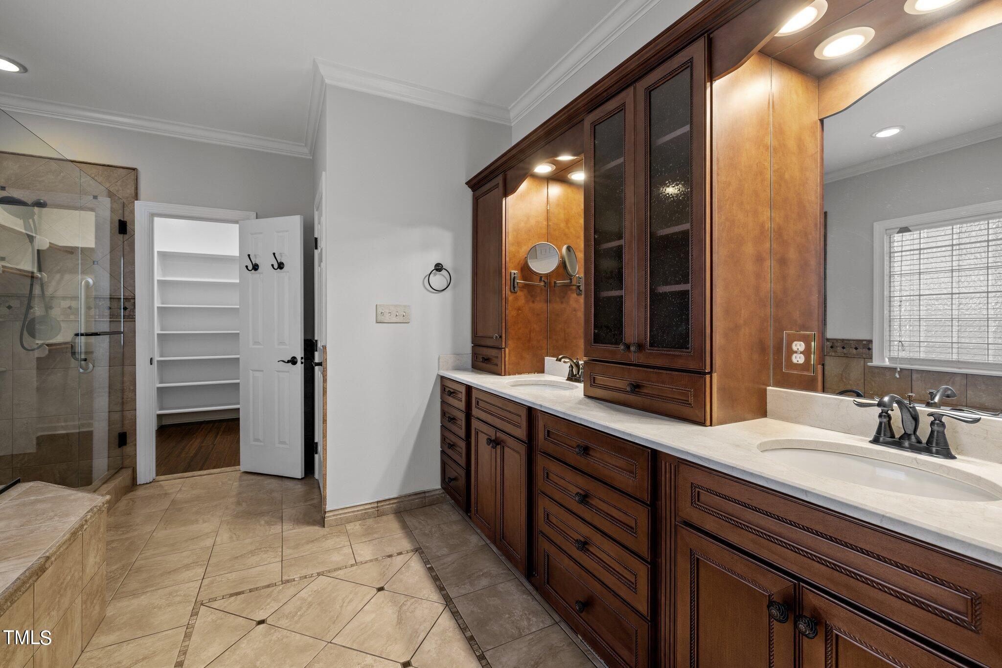 7621 Wilderness Road Raleigh, NC 27613 - Photo 25 of 60 Primary Bath