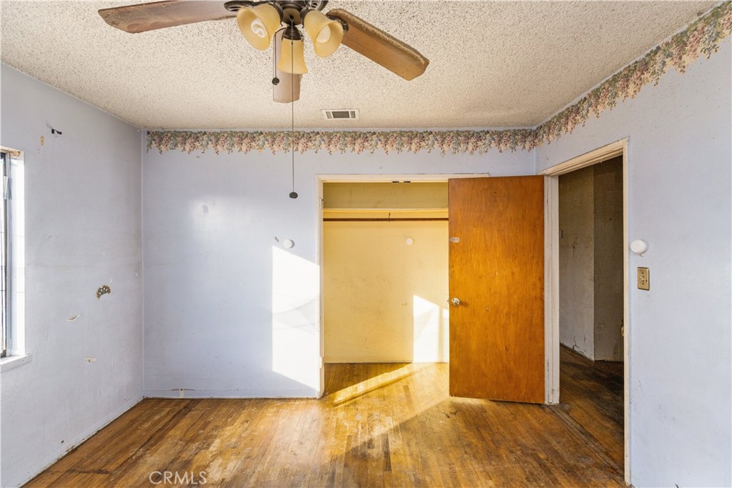 9044 Oak Street Bellflower, CA 90706 - Photo 14 of 30 a view of a room with wooden floor