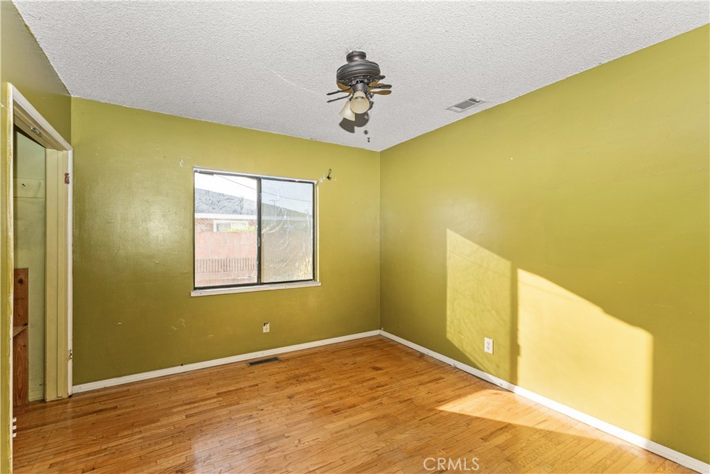 9044 Oak Street Bellflower, CA 90706 - Photo 16 of 30 a view of a big room with windows