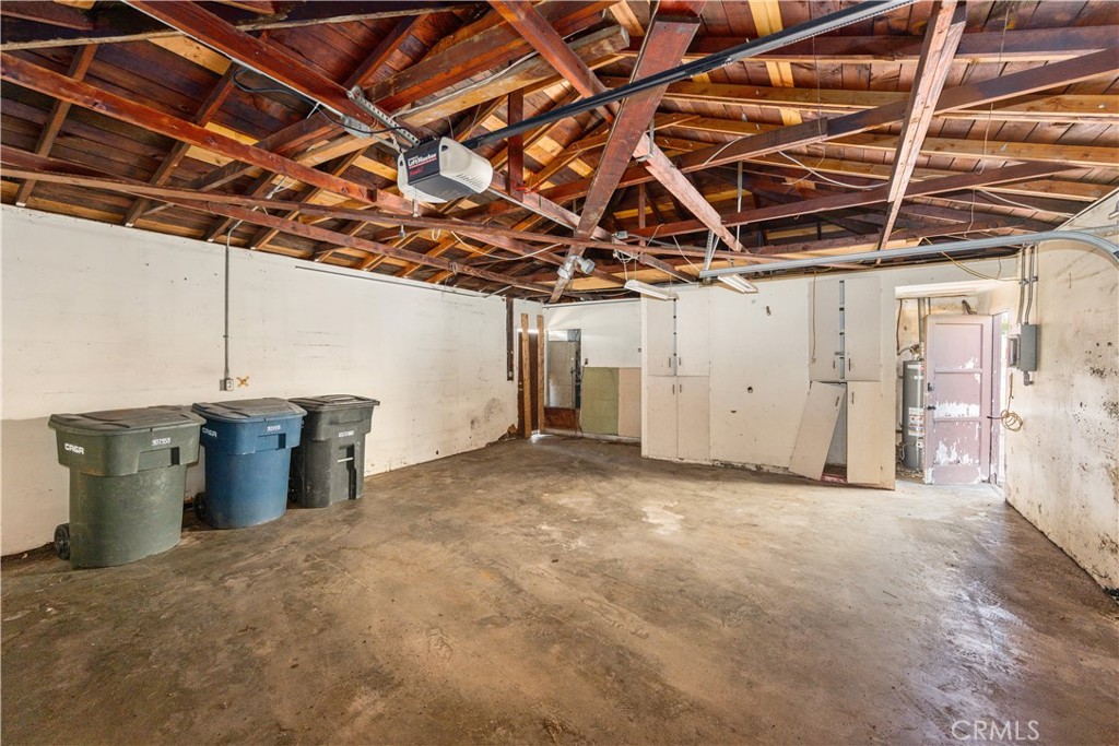 9044 Oak Street Bellflower, CA 90706 - Photo 23 of 30 a view of a utility room with storage