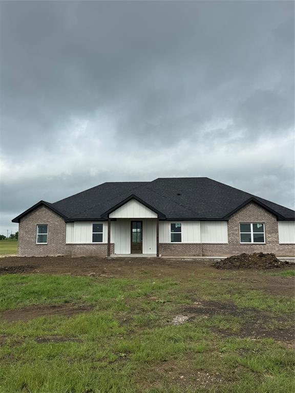 113 County Road 359 Muenster, TX 76252 - Photo 1 of 15 a house with garden in front of it