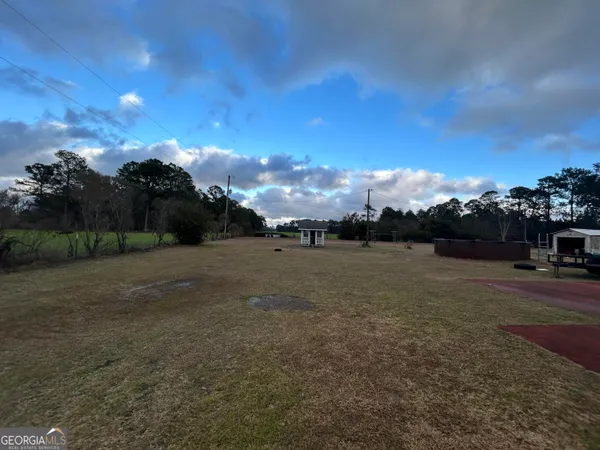 a view of outdoor space and yard
