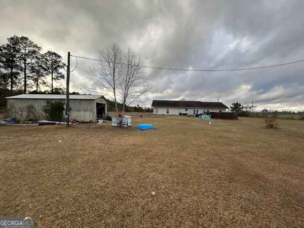 a view of a town with barn